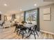 Inviting dining area with a modern table set, large window, and stylish decor flowing into the living space at 2341 Trollinger Dr, Catawba, NC 28609
