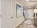 Bright foyer with wood-look floors, white doors, stairs, stylish decor, and ample natural light at 2341 Trollinger Dr, Catawba, NC 28609