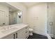 Elegant bathroom with dual sinks, a large mirror, and a glass-enclosed shower at 238 Laurel S Ave # B, Charlotte, NC 28207