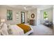 Bright bedroom with large window and an ensuite bathroom featuring modern fixtures at 238 Laurel S Ave # B, Charlotte, NC 28207