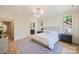 Bright, spacious main bedroom with hardwood floors and an ensuite bathroom with plenty of natural light at 238 Laurel S Ave # B, Charlotte, NC 28207