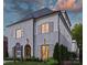 Elegant two-story home featuring a blend of white brick and siding, accentuated by dark roof and shutter details at 238 Laurel S Ave # B, Charlotte, NC 28207