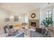 Cozy living room with a fireplace, hardwood floors, and stylish furnishings for a comfortable retreat at 238 Laurel S Ave # B, Charlotte, NC 28207