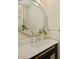 Charming powder room showcasing an ornate mirror and marble countertop at 2423 Lemon Tree Ln, Charlotte, NC 28211
