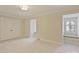 Bedroom with plush carpet, a double door closet and window seat at 2423 Lemon Tree Ln, Charlotte, NC 28211