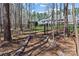 Fenced-in backyard features an iron fence and gate with view of home at 2615 Farm House Ln, Monroe, NC 28110