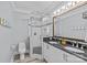 Bathroom highlighting double vanity, granite counters, and frameless glass shower at 2615 Farm House Ln, Monroe, NC 28110