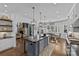 Modern Kitchen with island, stainless appliances and eat-in area at 2615 Farm House Ln, Monroe, NC 28110