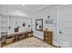 Farmhouse style mudroom with built-in bench, storage cubbies, and decorative accents at 2615 Farm House Ln, Monroe, NC 28110