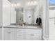 Bright bathroom features double vanity, modern lighting, and ample counter space at 2721 Kilgo Way, Charlotte, NC 28205