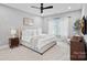 Serene bedroom with a large bed, soft colors, and sheer curtains for bright natural light at 2721 Kilgo Way, Charlotte, NC 28205