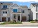 Charming two-story home with a craftsman style facade, front porch, and a one car garage at 2721 Kilgo Way, Charlotte, NC 28205
