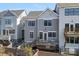 Exterior view of the back of a gray two-story home and deck at 2721 Kilgo Way, Charlotte, NC 28205