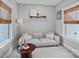 Comfortable sitting room featuring neutral tones, stylish couch, and natural light at 2721 Kilgo Way, Charlotte, NC 28205