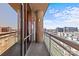 Private balcony offers great city views, glass railings, and overhead lighting at 315 Arlington Ave # 1206, Charlotte, NC 28203