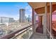 Private balcony showcasing city views and open access to the indoors through patio doors at 315 Arlington Ave # 1206, Charlotte, NC 28203