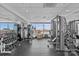 Bright, modern gym with weights and equipment and city views at 315 Arlington Ave # 1206, Charlotte, NC 28203