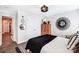 Contemporary bedroom featuring a stylish wooden bed, decor and closet doors at 3925 Rothwood Ln, Harrisburg, NC 28075