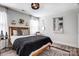 Relaxing bedroom featuring a wood frame bed, decor accents and a large window at 3925 Rothwood Ln, Harrisburg, NC 28075