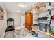 A multi-purpose bonus room with a treadmill, storage, and cozy accents at 3925 Rothwood Ln, Harrisburg, NC 28075