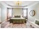 Calming bedroom features a unique ceiling tray, patterned curtains and a plush rug at 3925 Rothwood Ln, Harrisburg, NC 28075