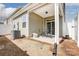 Exterior view of patio with seating area, providing a peaceful outdoor escape at 3925 Rothwood Ln, Harrisburg, NC 28075