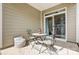 Inviting patio with sliding glass doors, enhancing indoor-outdoor living at 3925 Rothwood Ln, Harrisburg, NC 28075