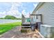 Outdoor deck with gray bins and AC unit for backyard enjoyment, relaxation, and entertaining at 4009 Polkville Rd, Shelby, NC 28150