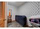 A compact storage room featuring unique wallpaper, offering practical space for organization and storage at 4009 Polkville Rd, Shelby, NC 28150