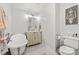 Bright bathroom features a standalone tub, updated vanity, and toilet at 534 Kirby Ln, Matthews, NC 28104