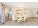 Elegant dining room with hardwood floors and a view of the kitchen area at 534 Kirby Ln, Matthews, NC 28104