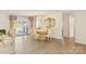 Elegant dining room with hardwood floors, chandelier, and access to the backyard at 534 Kirby Ln, Matthews, NC 28104