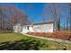 Stunning home with crisp white exterior and manicured landscaping at 534 Kirby Ln, Matthews, NC 28104