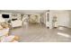 Open-concept space with hardwood flooring, fireplace, living, and dining areas at 534 Kirby Ln, Matthews, NC 28104