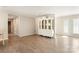 Open living area with hardwood floors, natural light, and elegant display cabinet at 534 Kirby Ln, Matthews, NC 28104