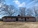 A full shot of the back of the house, showing the neutral siding, roof, and yard at 5534 Little Mountain Rd, Catawba, NC 28609