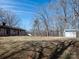 Wide shot of backyard featuring a shed and lawn mower at 5534 Little Mountain Rd, Catawba, NC 28609
