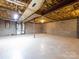 Open unfinished basement area with concrete flooring, block walls, and exposed ceiling at 5534 Little Mountain Rd, Catawba, NC 28609