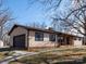Ranch style home featuring a side-entry garage, stone accents, and comfortable front porch at 5534 Little Mountain Rd, Catawba, NC 28609