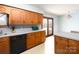 Classic kitchen featuring wooden cabinets and ample counter space, adjacent to a cozy breakfast area at 5534 Little Mountain Rd, Catawba, NC 28609
