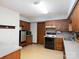 Functional kitchen featuring wood cabinets and essential appliances, ready for your culinary touch at 5534 Little Mountain Rd, Catawba, NC 28609