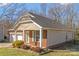 Charming home with brick and siding, manicured landscaping, and an attached two-car garage at 571 Rough Hewn Ln, Rock Hill, SC 29730