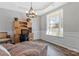 Comfortable office space with natural light, wood desk, and modern decor at 571 Rough Hewn Ln, Rock Hill, SC 29730