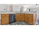 Functional kitchen area with granite countertops and stainless steel dishwasher at 571 Rough Hewn Ln, Rock Hill, SC 29730