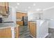 Well-appointed kitchen featuring stainless steel appliances, granite countertops, and ample storage at 571 Rough Hewn Ln, Rock Hill, SC 29730