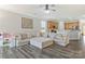 Open-concept living area featuring a large sectional sofa and seamlessly connected with the kitchen at 571 Rough Hewn Ln, Rock Hill, SC 29730