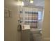 Traditional bathroom with a tub/shower combo and neutral color scheme at 5924 Freedom Dr, Charlotte, NC 28214