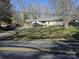 Street view of house with carport and paved driveway at 5924 Freedom Dr, Charlotte, NC 28214