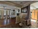 Living room showcases hardwood floors, ample lighting, and arched doorway at 5924 Freedom Dr, Charlotte, NC 28214