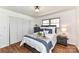 Comfortable bedroom with hardwood floors, natural light and a closet for storage at 7770 Sherrills Ford Rd, Sherrills Ford, NC 28673